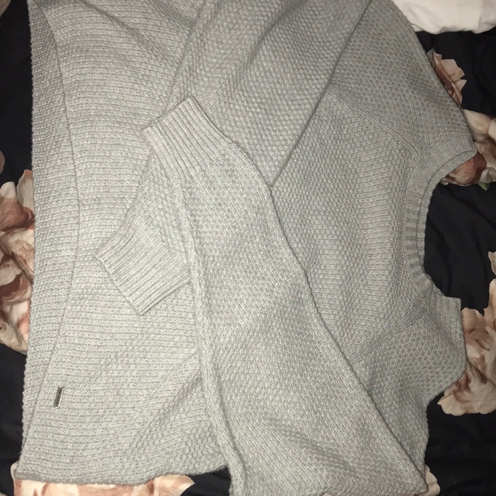 woman’s knitted sweater